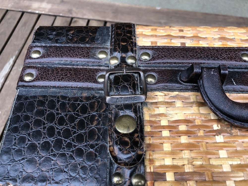 Vintage Ature trunk featuring a hand-painted palm tree