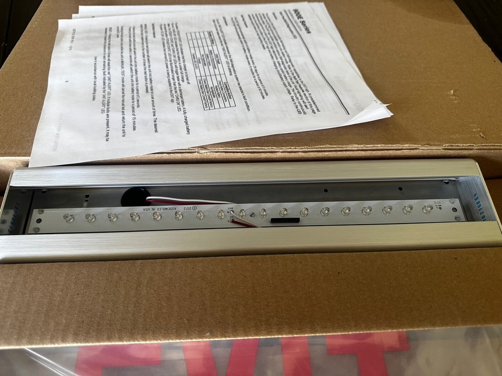 900E LED Exit Sign Edge Lit Red Letters Single Face Battery Backup
