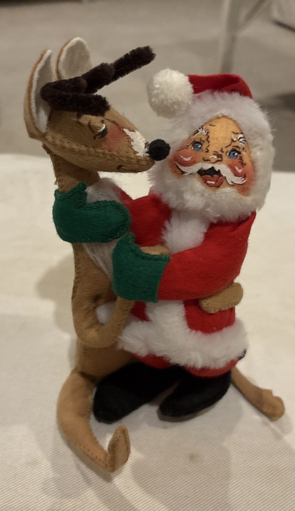 Analee Reindeer hugging Santa
