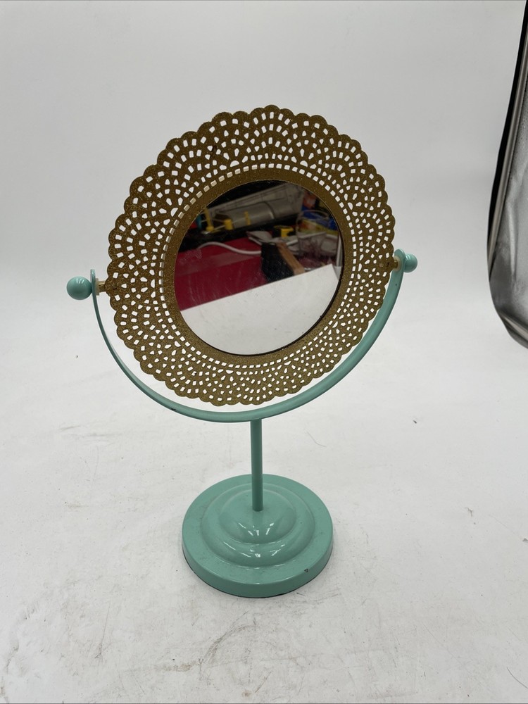 Vintage Tabletop Mirror With Gold Frame And A Blue Base