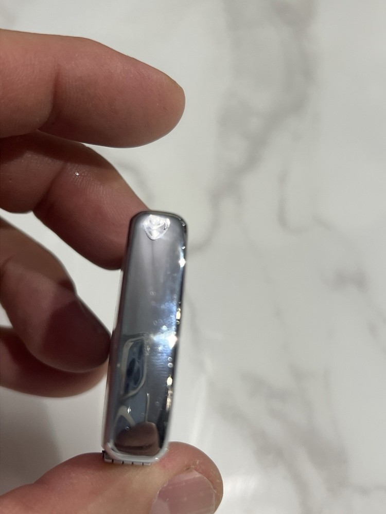 vintage “lowrey” silver matchbox holder