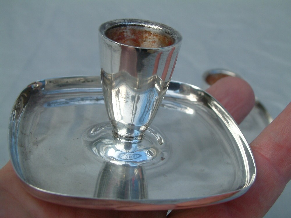 A.E. Jones Pair of Sterling Silver Candlesticks. Birmingham 1973