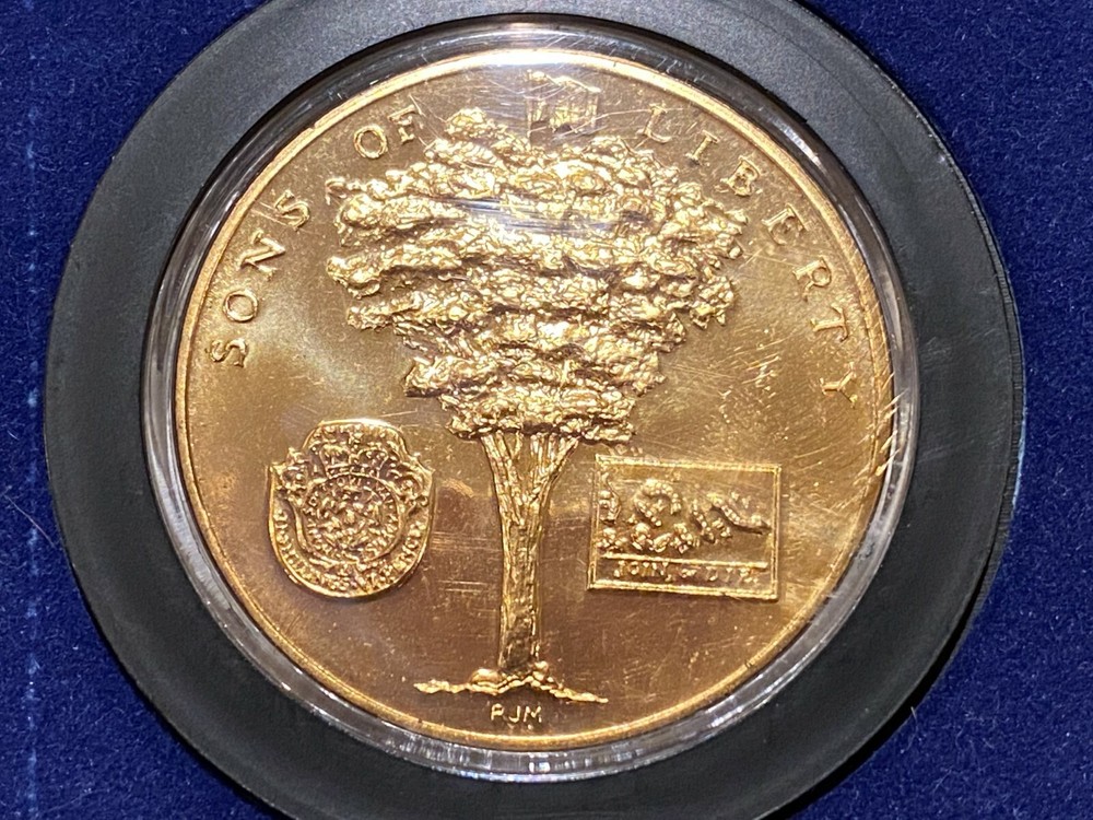 Three Commemorative coins/medals (Sterling, Silver, Bronze)