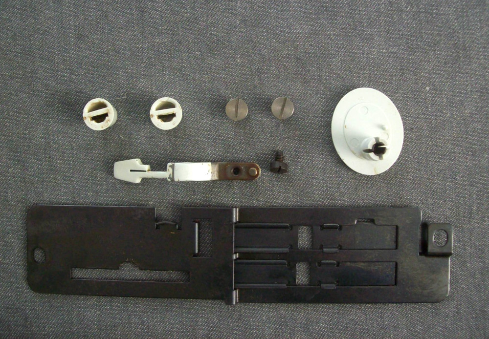 Singer 600E Sewing Machine Front Face Cover Plate Panel, Knobs, & Misc. Parts.