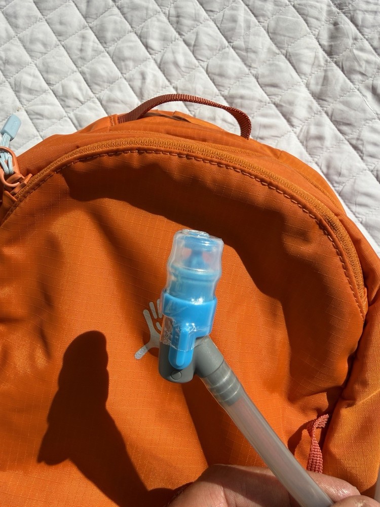 Hydro Flask Down Shift Hiking Backpack 14 Liter Hydration Day Pack Bronze Orange