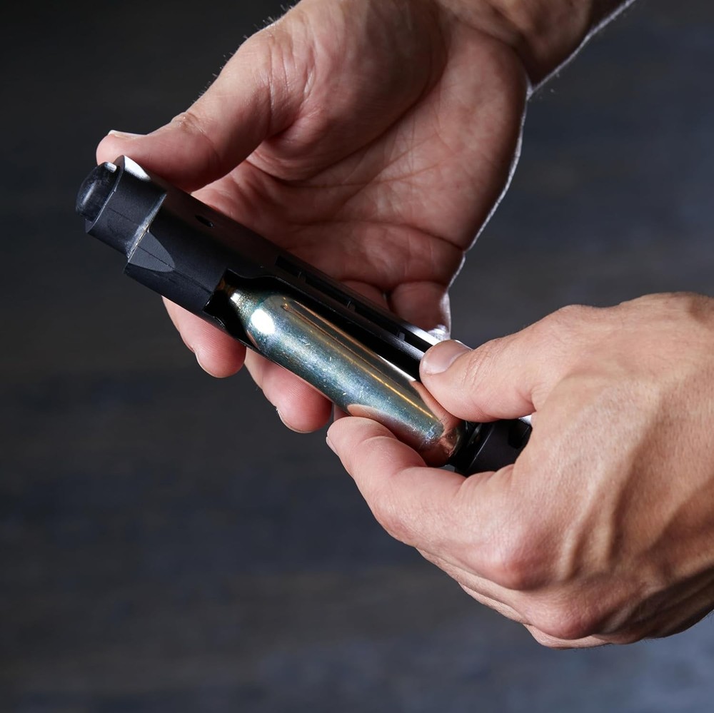 Compact Home Defense Pepper Launcher – 7 Projectiles & Quick CO2 Reload System