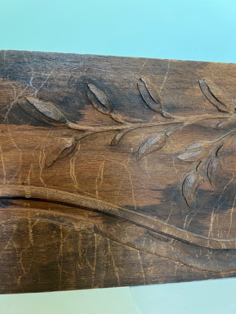 salvaged antique carved board