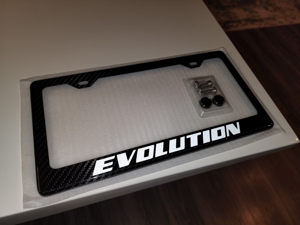 Reflective White Lacer Evo / Evolution 100% Carbon Fiber License Plate Frame