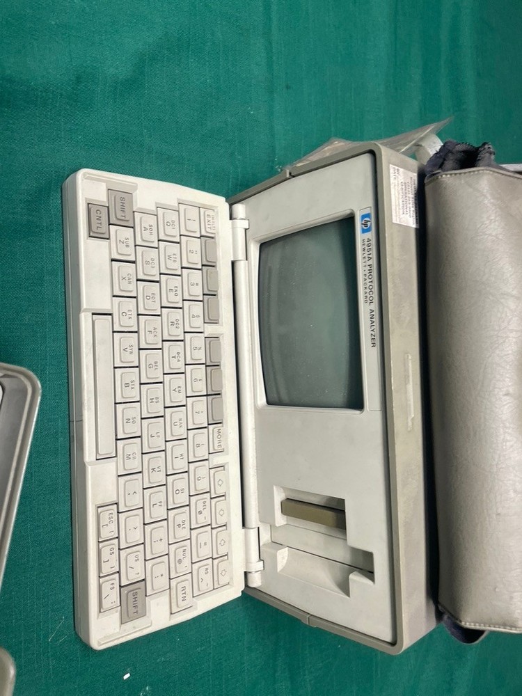 Hewlett Packard HP 4951A protocol analyzer with accessories 18180A interface