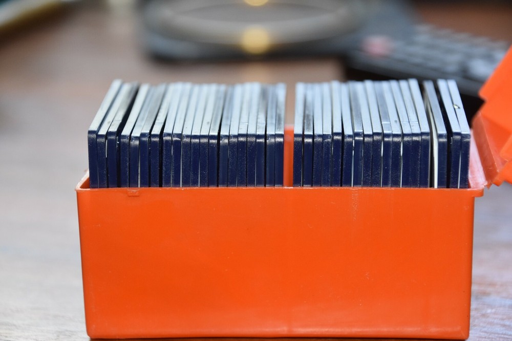 ONE HUNDRED 35 mm  PLASTIC SLIDE FRAMES IN ORIGINAL PLASTIC BOXES, excellent co
