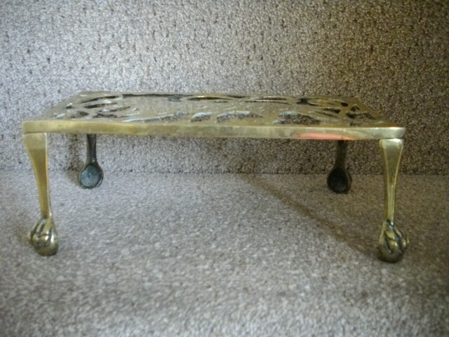 Brass trivet stand with strolling Tiger c1880
