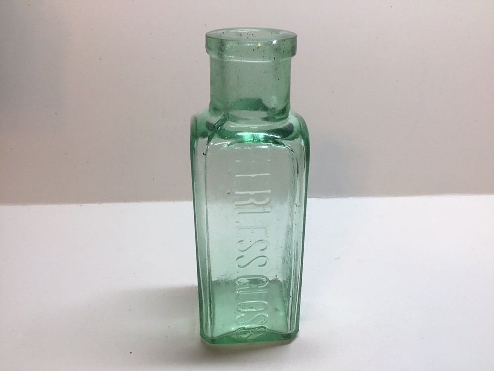 Antique Minty Green Peerless Gloss Polish Bottle.