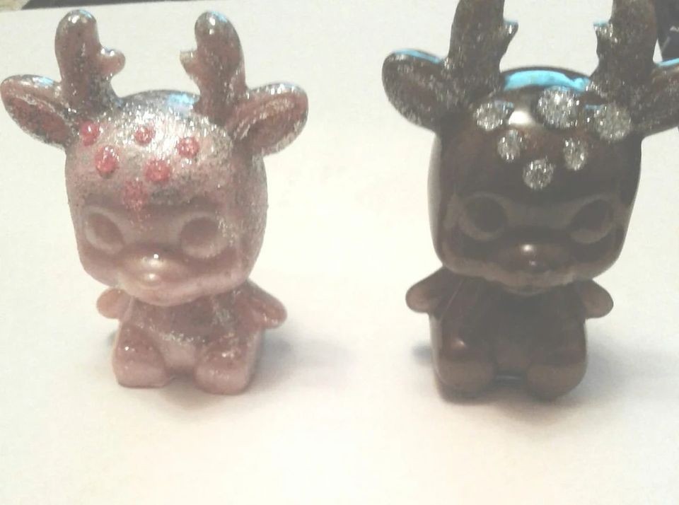 2 reindeer epoxy figurines