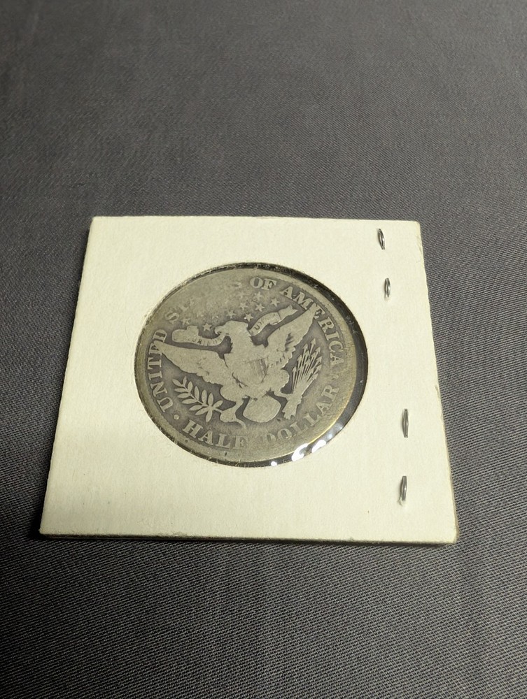 Two 1907 Barber Liberty Half Dollar Coins.