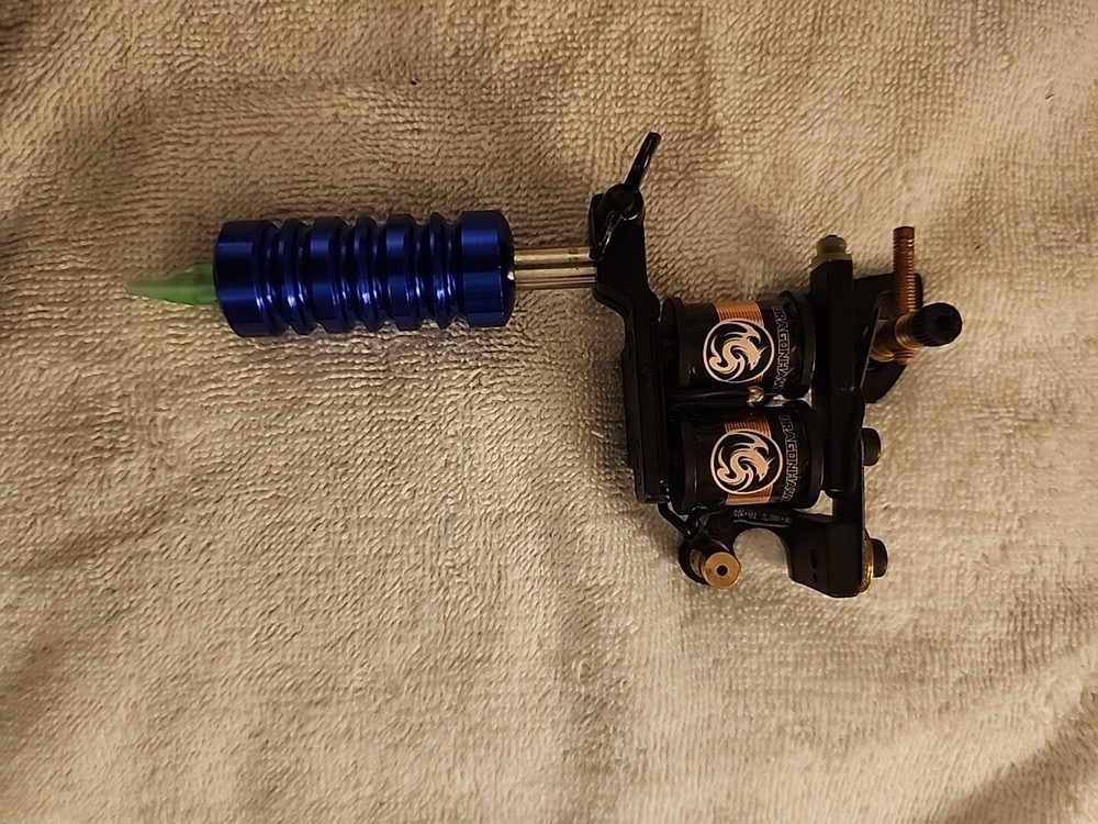 Dragon hawk Tattoo Machine, 2 Tubes, And 65 Assorted Needles