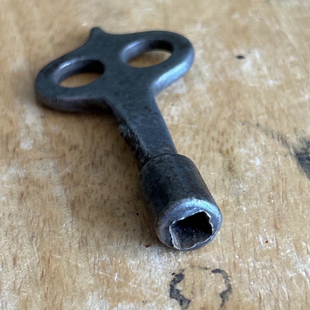 Owl head cast iron clock key 3/16"square rachet end