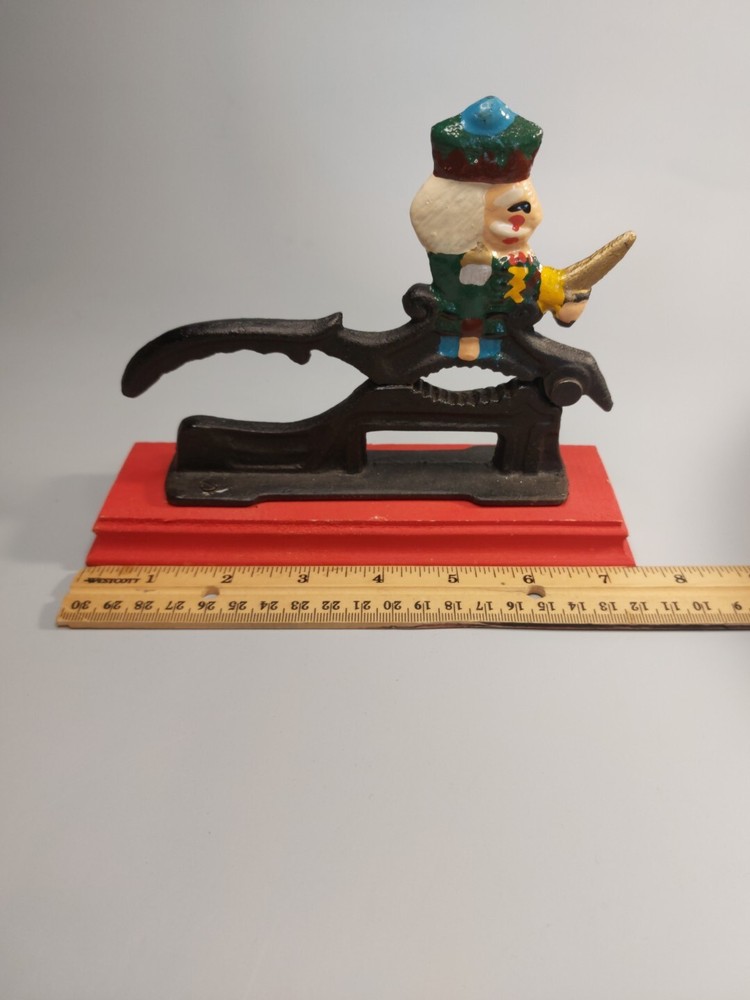 Cast Iron Painted Soldier Nut Cracker on wood base
