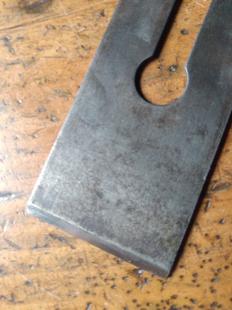 STANLEY 2" V-LOG0 (distressed) PLANE BLADE. READ FULL DESCRIPTION.