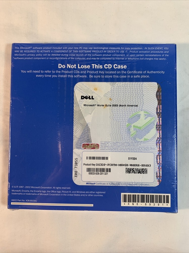 Microsoft Works Suite 2003 Set with Product Key. never used.