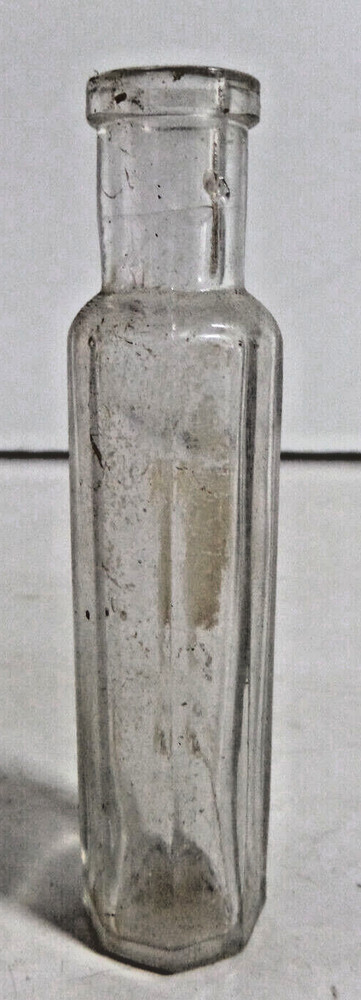 small octagon shaped bottle antique EMPTY