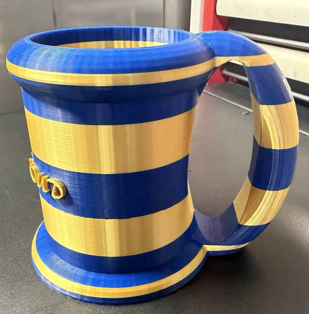Personalized USCG Warrant Officer drink holder with handle.