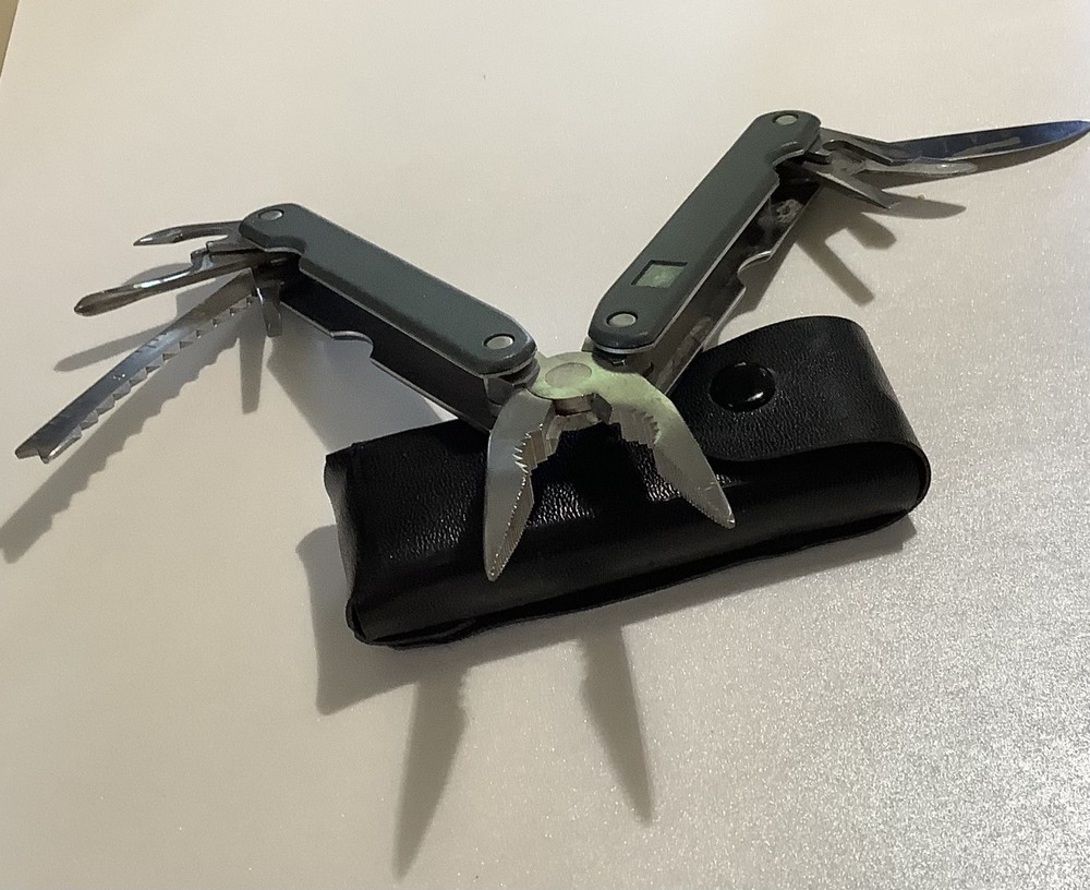 SALE $8 Multitool 8 Function Black Handle Not Branded In Case