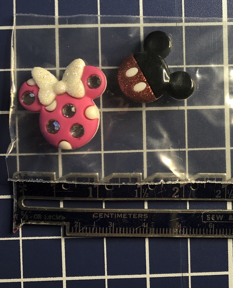 Buttons mouse hats, boy and girl. One pair