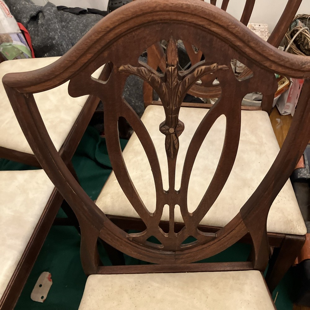 Four matching shield back mahogany dining room chairs