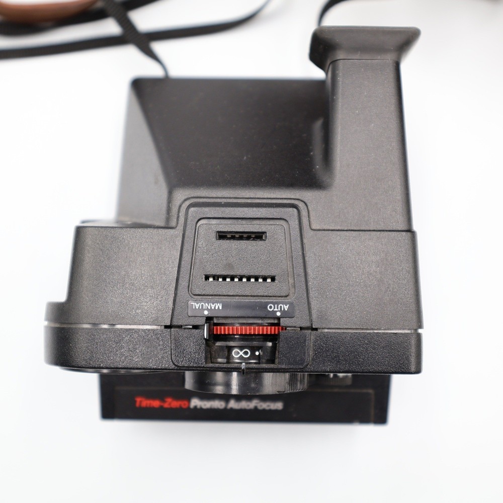 Polaroid Time-Zero Pronto Sonar AutoFocus Land Camera and Case and 10 Flash Bars