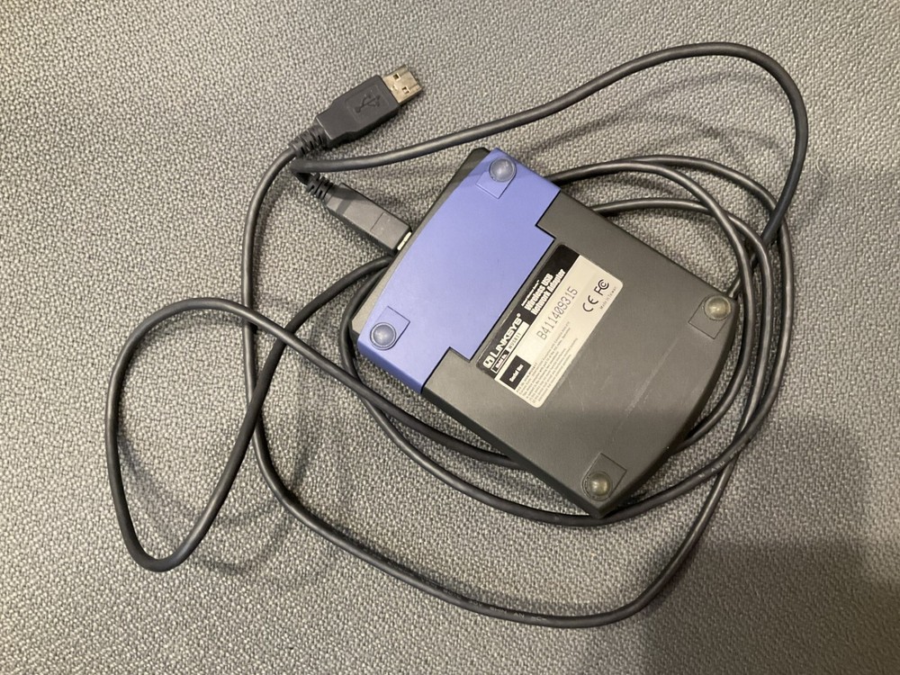 Linksys WUSB11 Wireless USB Network Adapter.