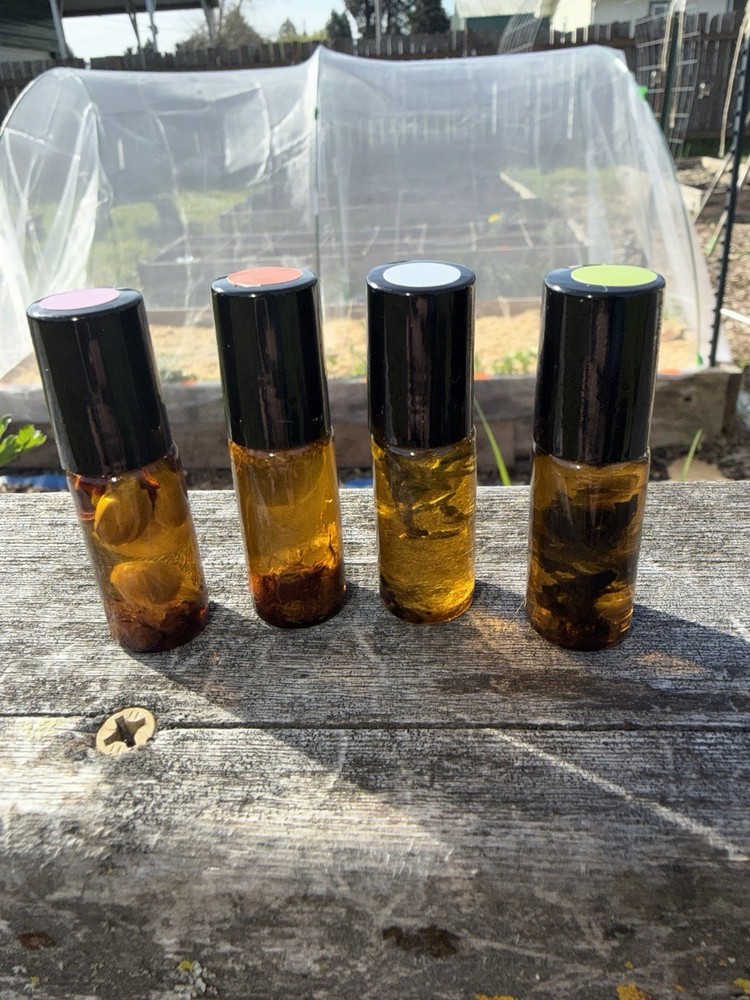 The Witch’s Quadrivium Oils- Attract • Shield • Root • See