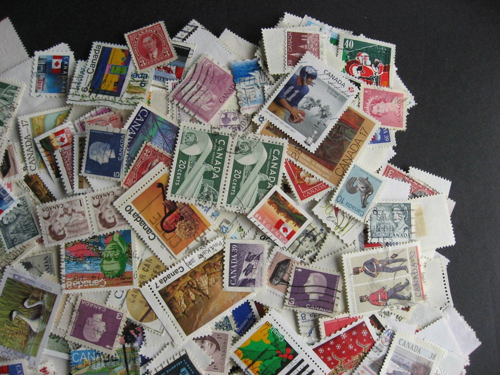 Canada colossal mixture (duplicates,mixed cond) 2000 laid out35%comems,65%defins