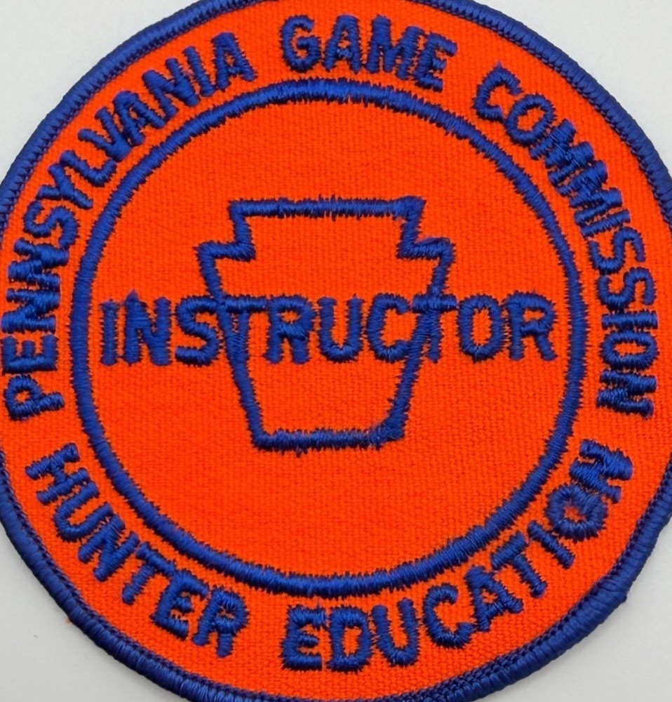Pennsylvania Game Commission Instructor Hunter Education Round Orange Blue