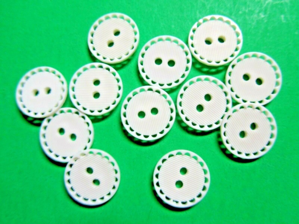 (12) 5/8" OPENWORK RIM WHITE PLASTIC 2-HOLE BUTTONS NEW (H509)