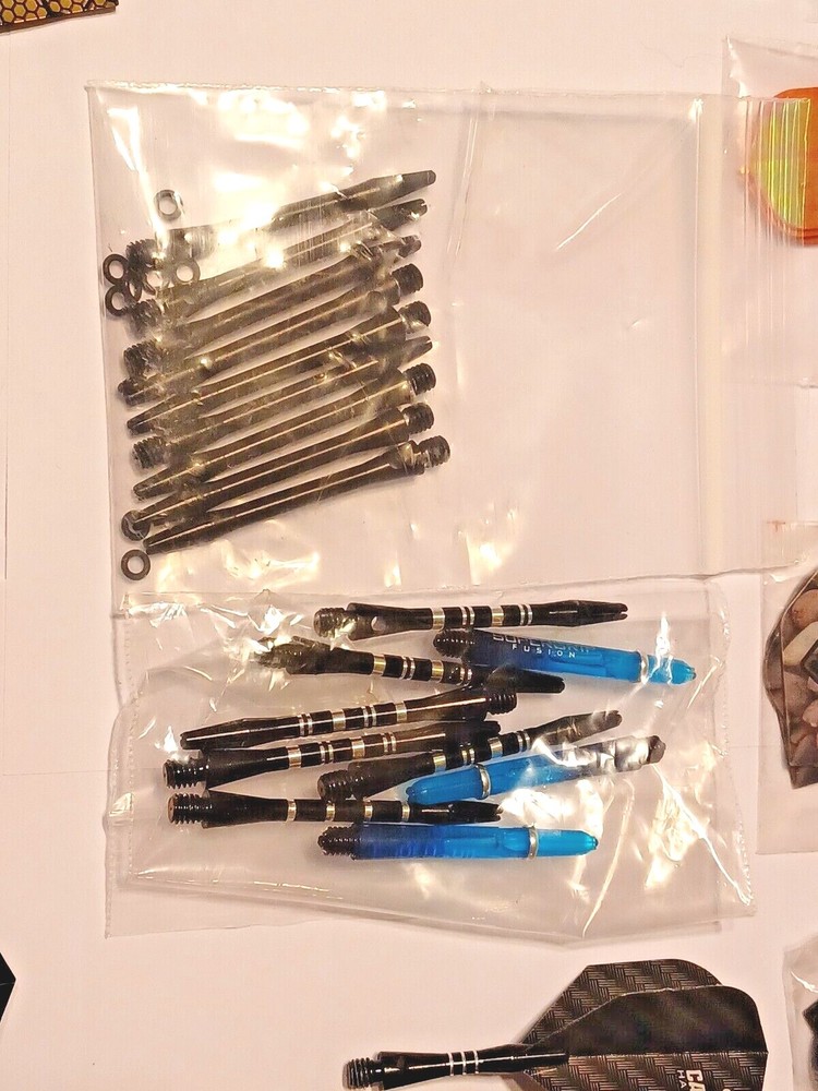 6 Darts And Accessories