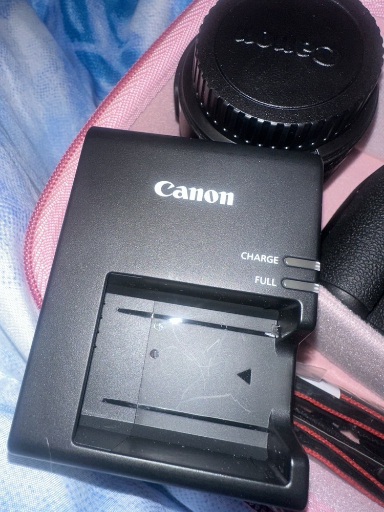 Canon EOS Rebel T7 DSLR Bundle 18-55mm Lens, Charger, Strap, Case, SD Reader
