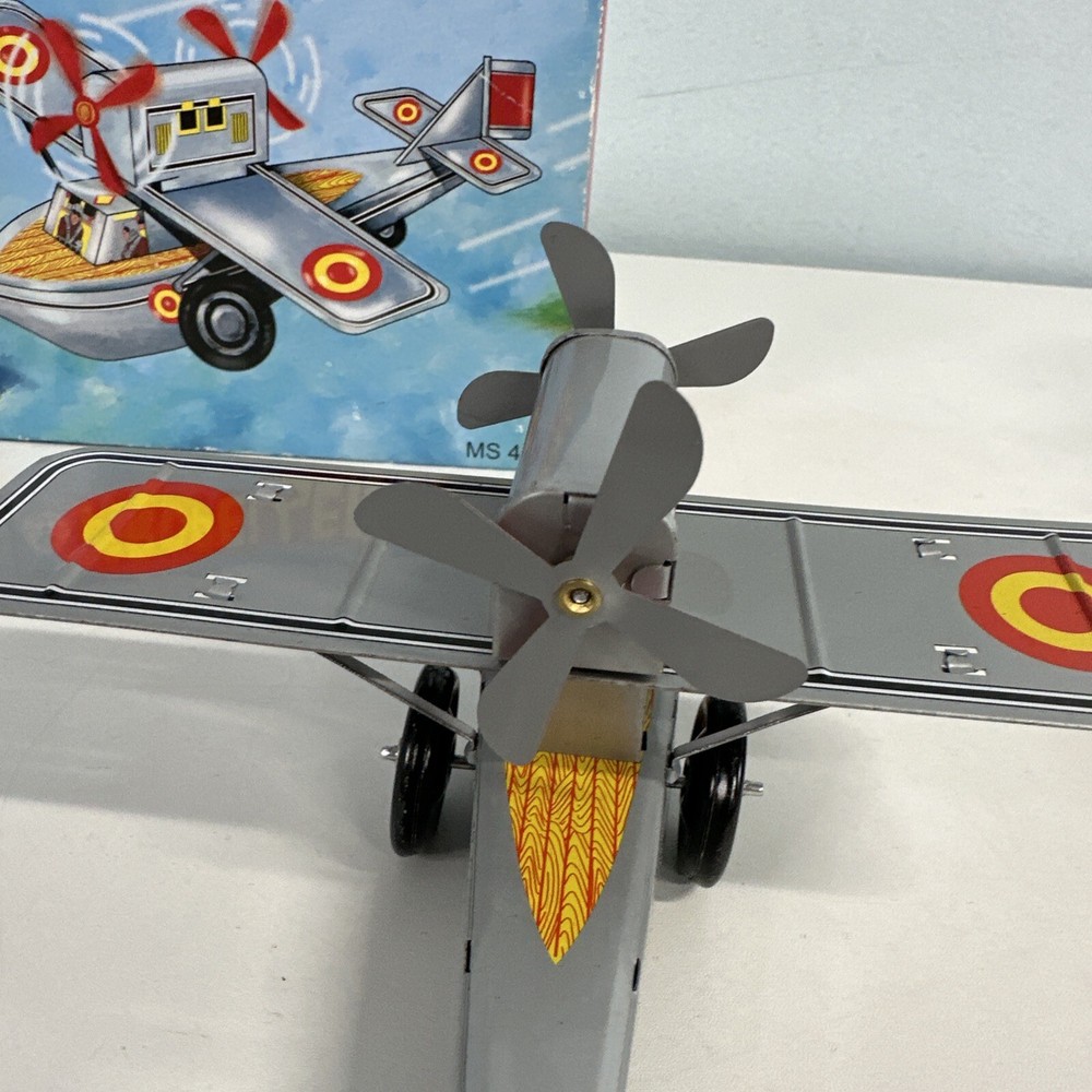 Supt Propeller Plane (We could not get this to work) Small Tin plane