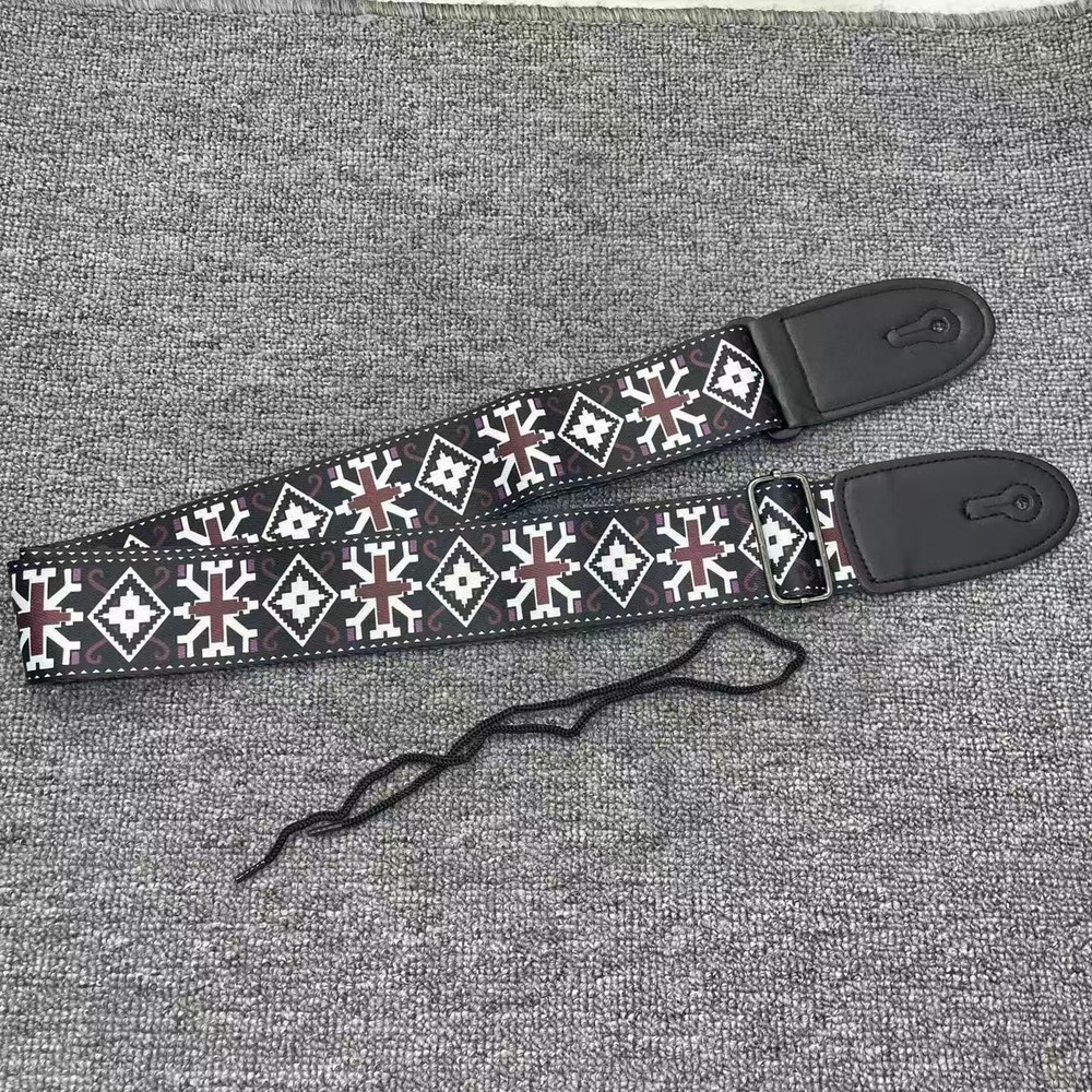Black checkered pattern guitar strap, highly functional, currently on sale