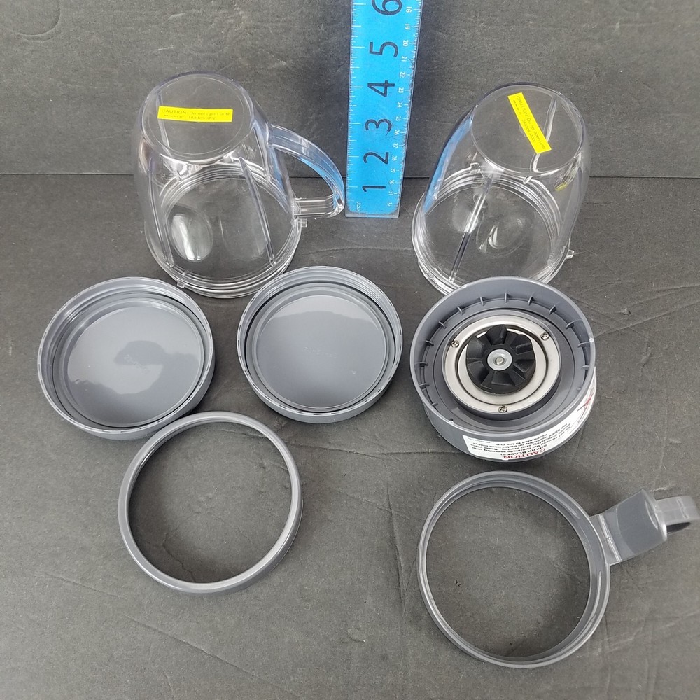 NutriBullet Mixed Lot Replacement Short Mixing Cups Handled Cup Lids Blade