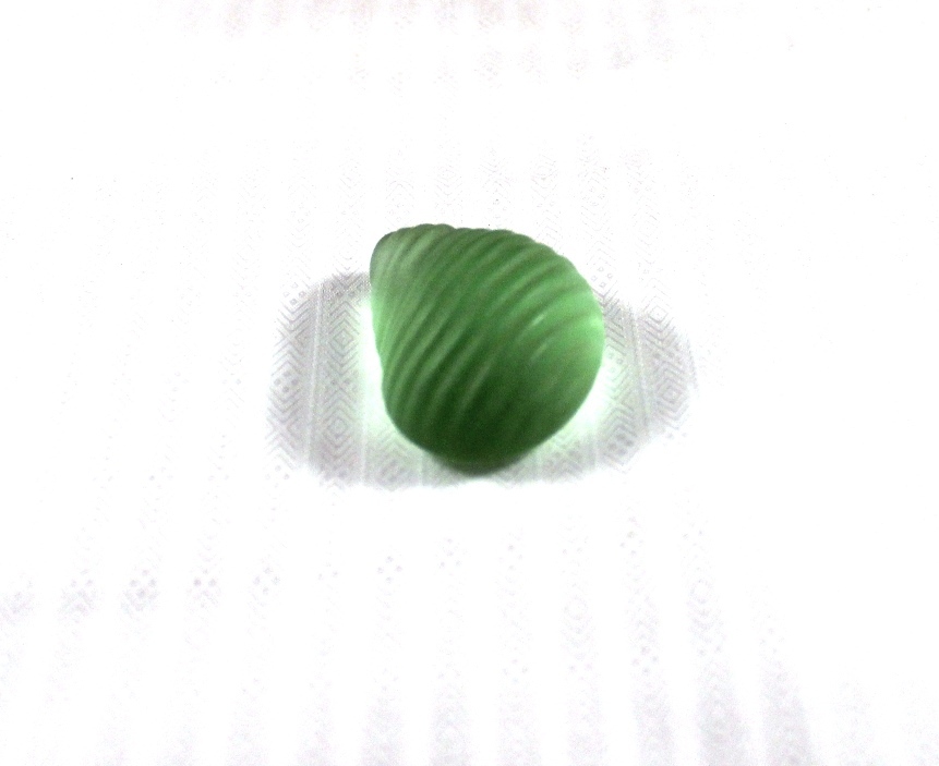 Unusual 1.5" Resin or Hard Plastic Stone?