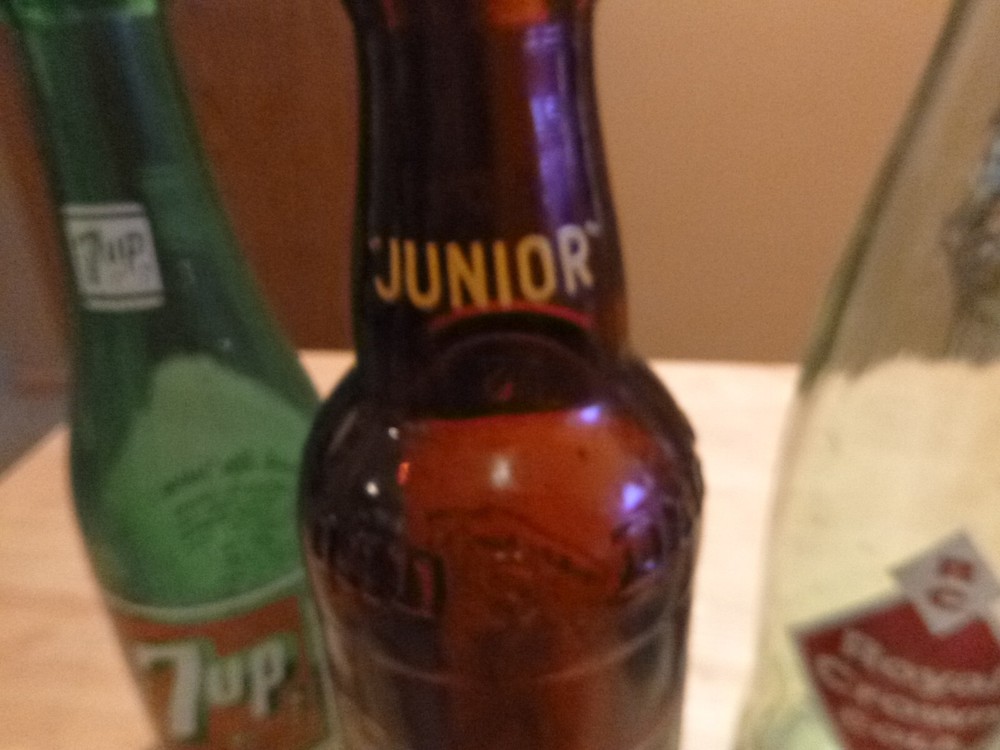 FIVE NICE VINTAGE POP BOTTLES