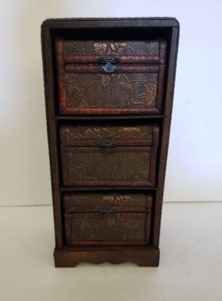 3 Small Storage Trunks in Shelving Unit