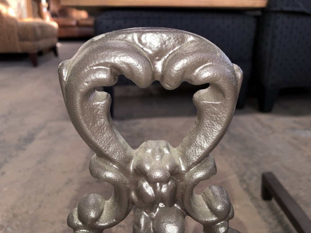 Andirons With Faces