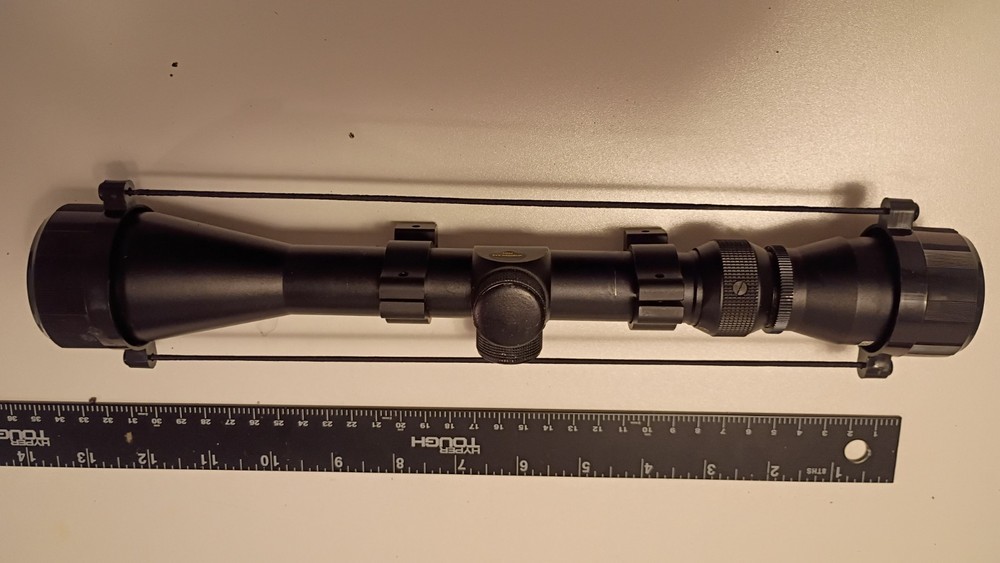Dead Ringer 3-9 by 40 rifle scope w/ rings