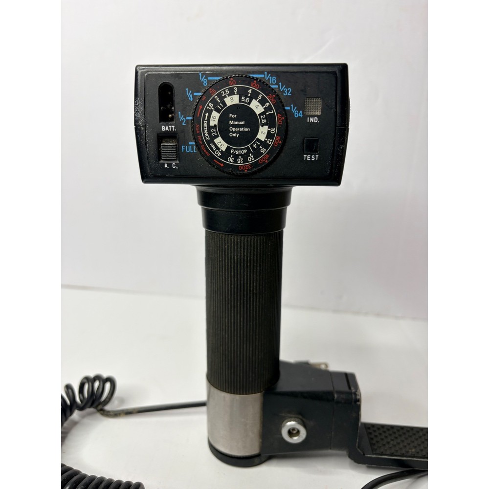 Sunpak Auto 511 Thyristor Handle Mount Flash with Bracket and Sync Cord Black