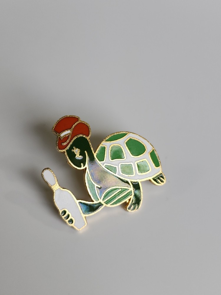 Turtle in Orange Hat Holding Bowling Pin Lapel Pin