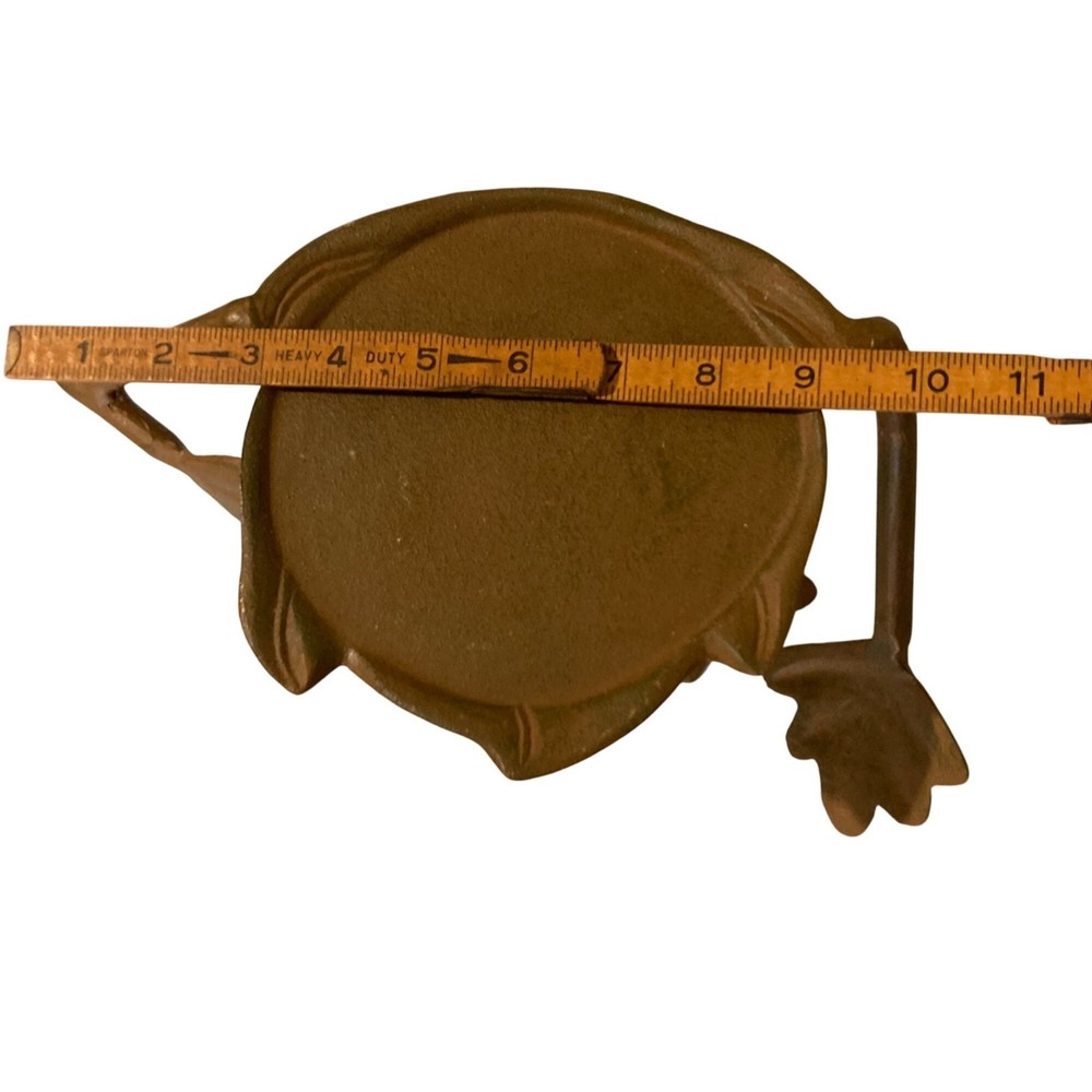 Cast Metal Decorative Stand With Leaf Hands And Feet
