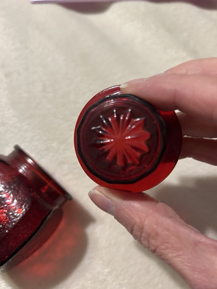 Vintage ruby red apothecary jar With A Textured Finish And Lid With Star Pattern