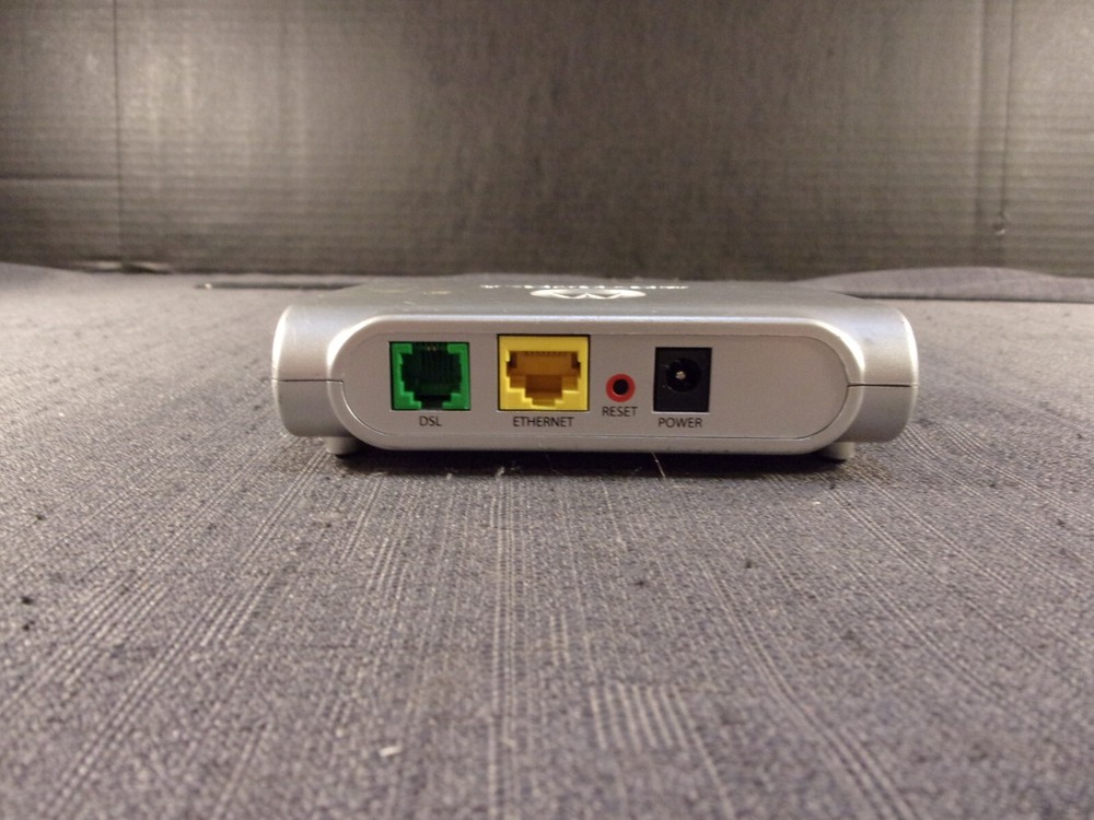 MOTOROLA SILVER E141744 INTERNET MODEM/ROUTER
