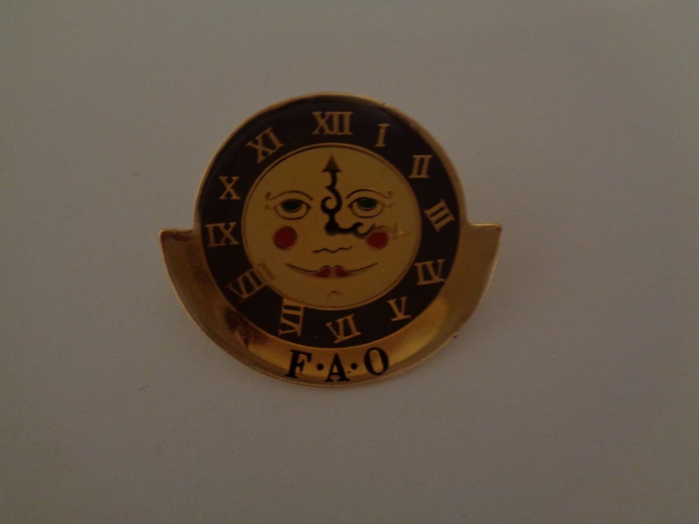F.  A.  O.  SHWARTZ TOY STORE ORIGINAL CLOCK PIN MINT
